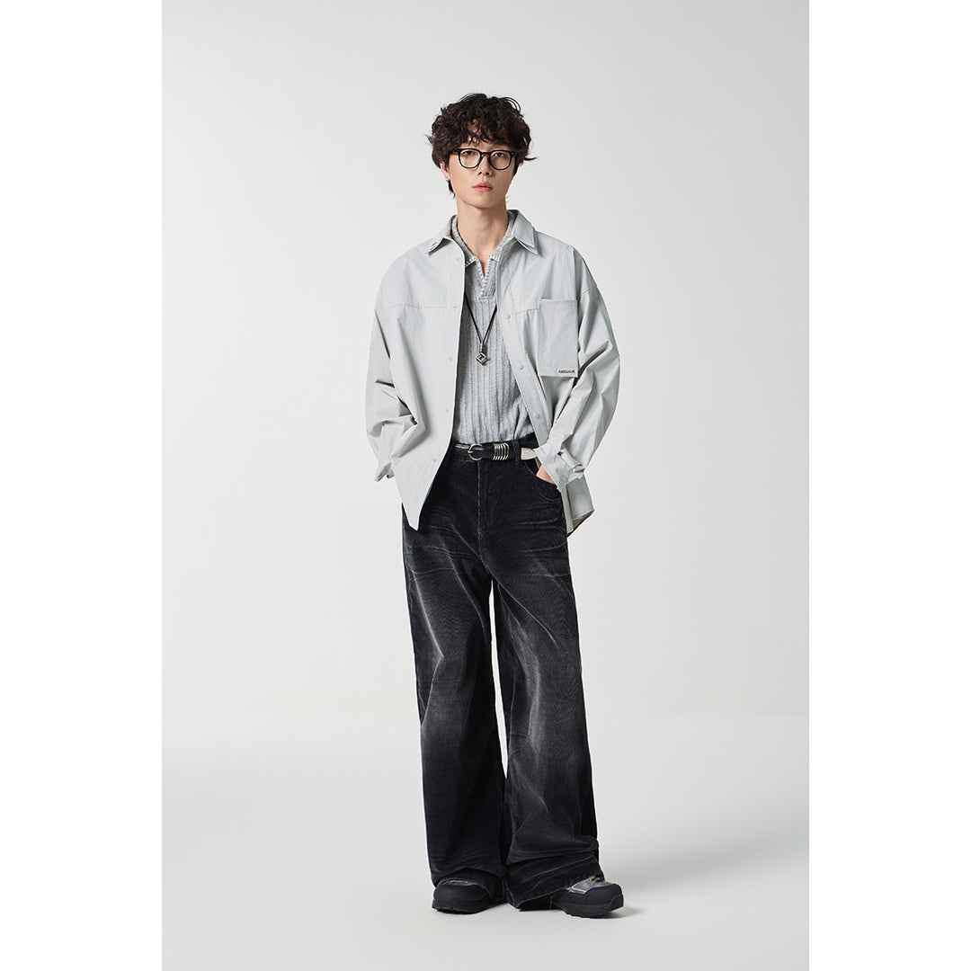 Unisex Oversize Hemd mit technischem Material, Brustklappe und gerundetem Saum Shop Nory