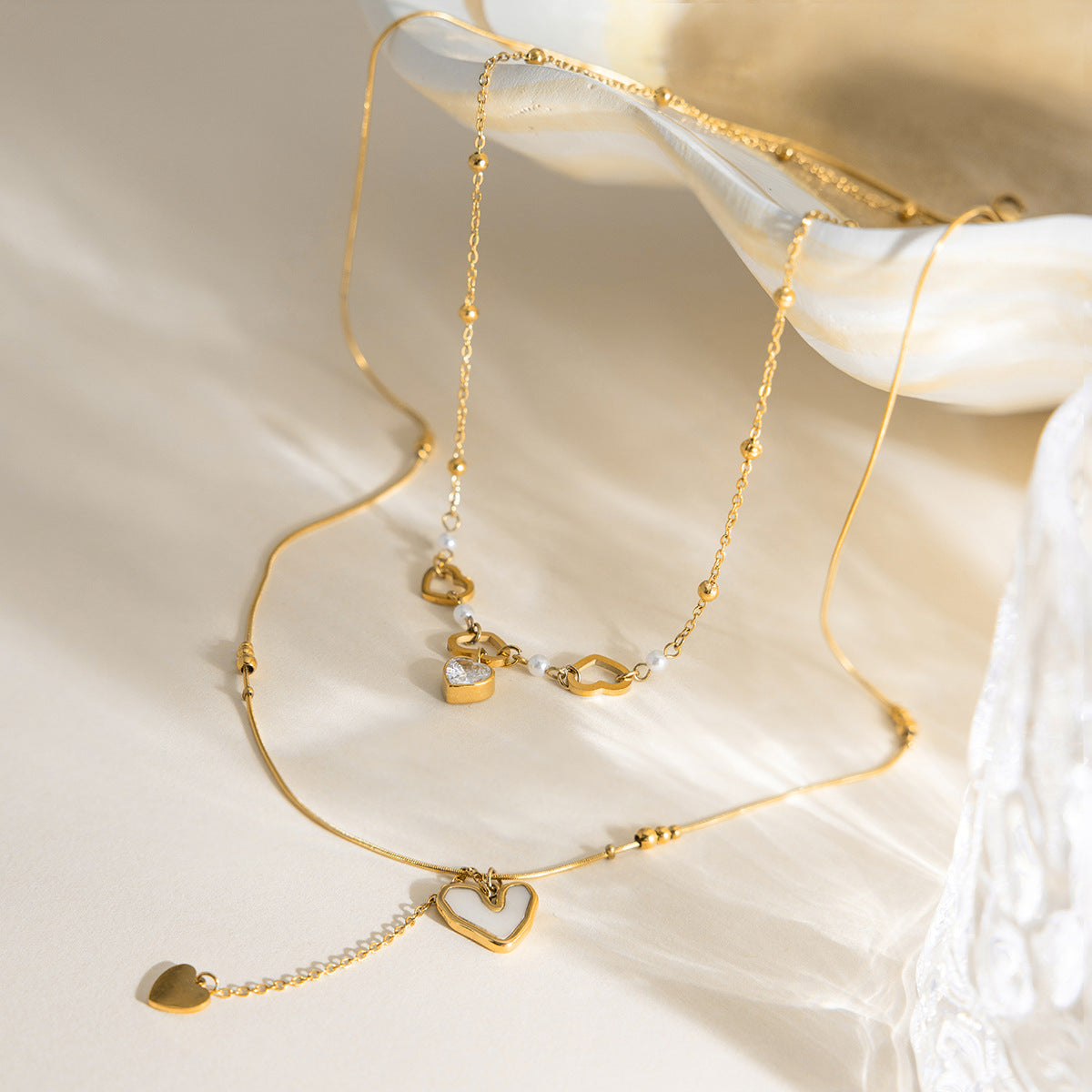 Damen Halskette mit mehrfachen Herzen und hochwertiger Edelstahlverarbeitung Shop Nory