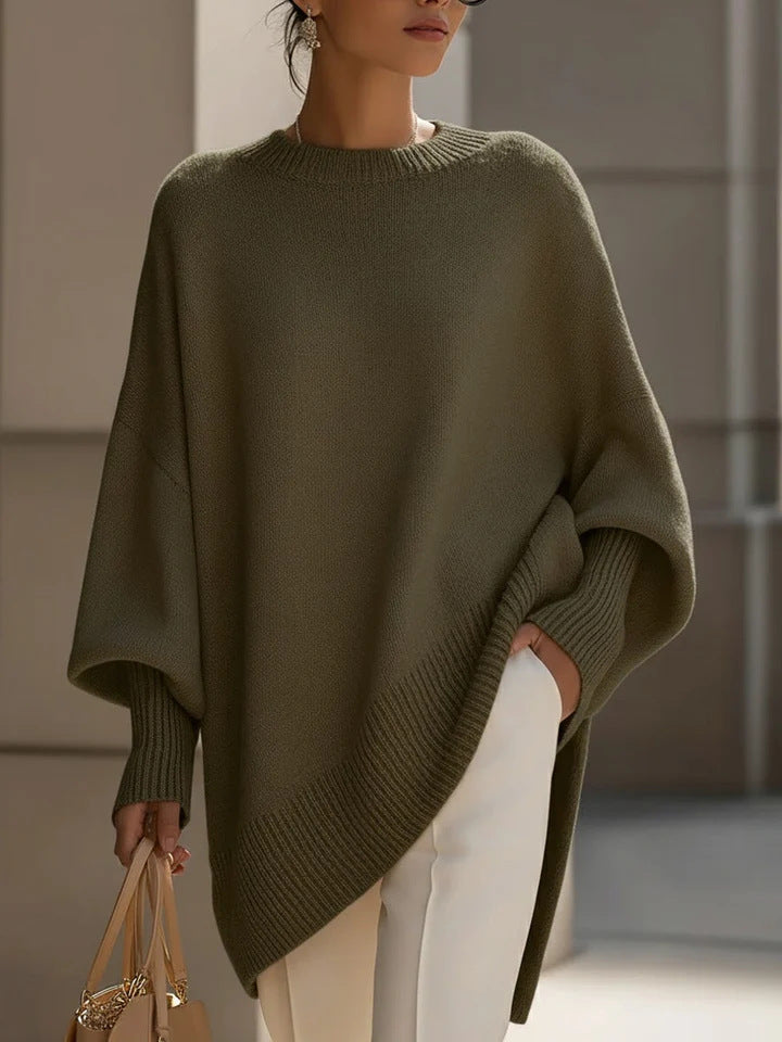 Damen nan Oversize Strickponcho mit asymmetrischem Saum und gerippten Ärmeln Shop Nory