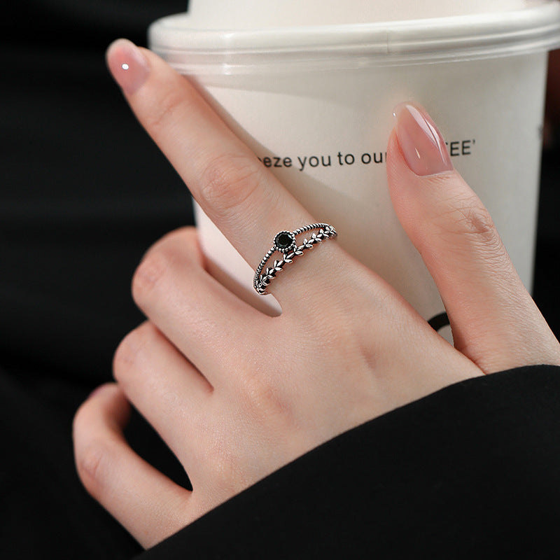 Damen eleganter Ring mit kunstvollem Design und funkelndem Stein Shop Nory