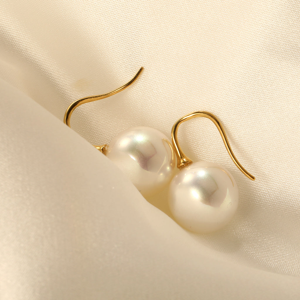 Damen Ohrstecker mit funkelnden Zirkonia und eleganten Perlenakzenten Shop Nory