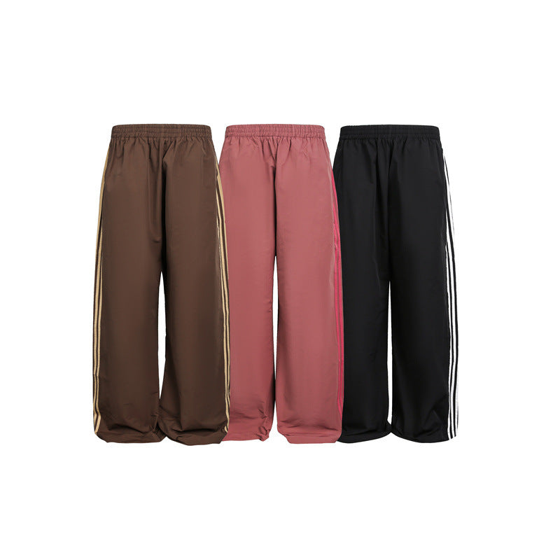 Damen weite Satin-Trainingshose mit elastischem Bund und seitlichen Kontraststreifen Shop Nory