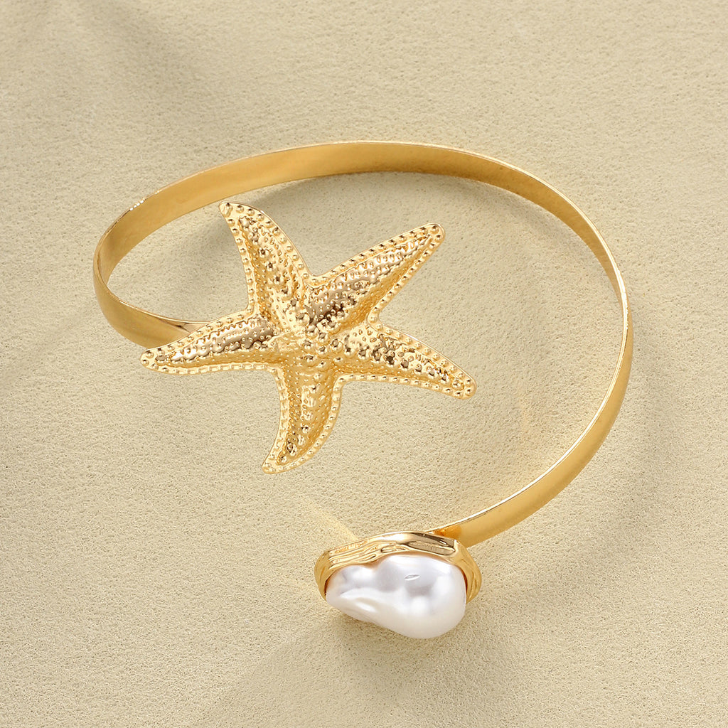Damenarmband mit maritimen Sternen- und Perlenmotiven Shop Nory