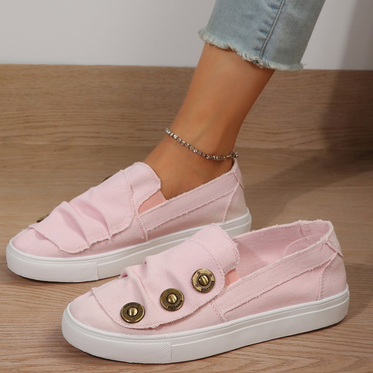 Damen Slip-On Sneakers mit modischen Knopfdetails