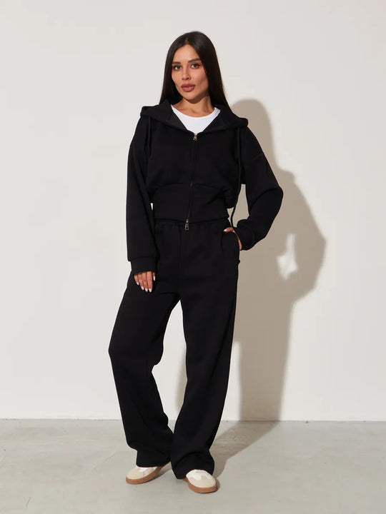 Damen kurzes Kapuzen-Zipshirt mit tailliertem Tunnelzug und weit geschnittene High-Waist-Loungehose Shop Nory