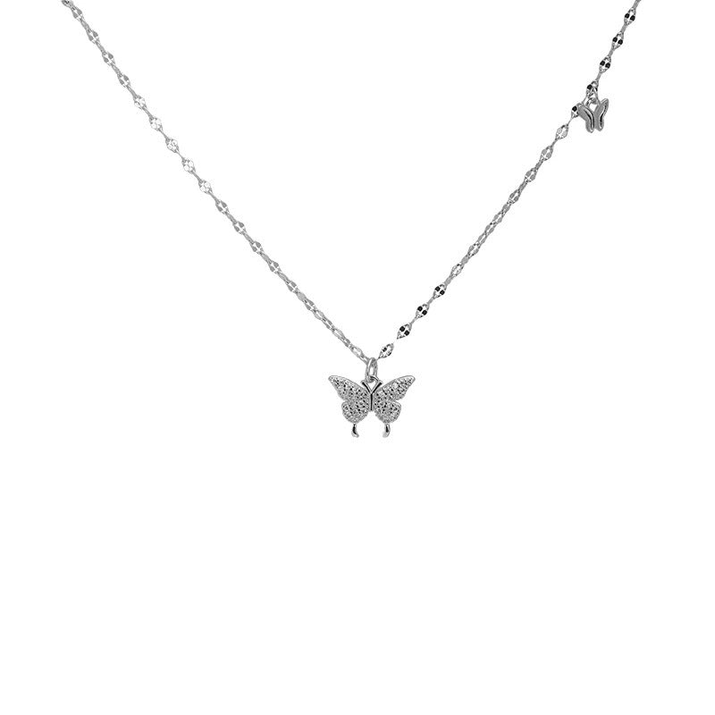 Damen Halskette mit funkelndem Schmetterlingsanhänger und zartem Design Shop Nory