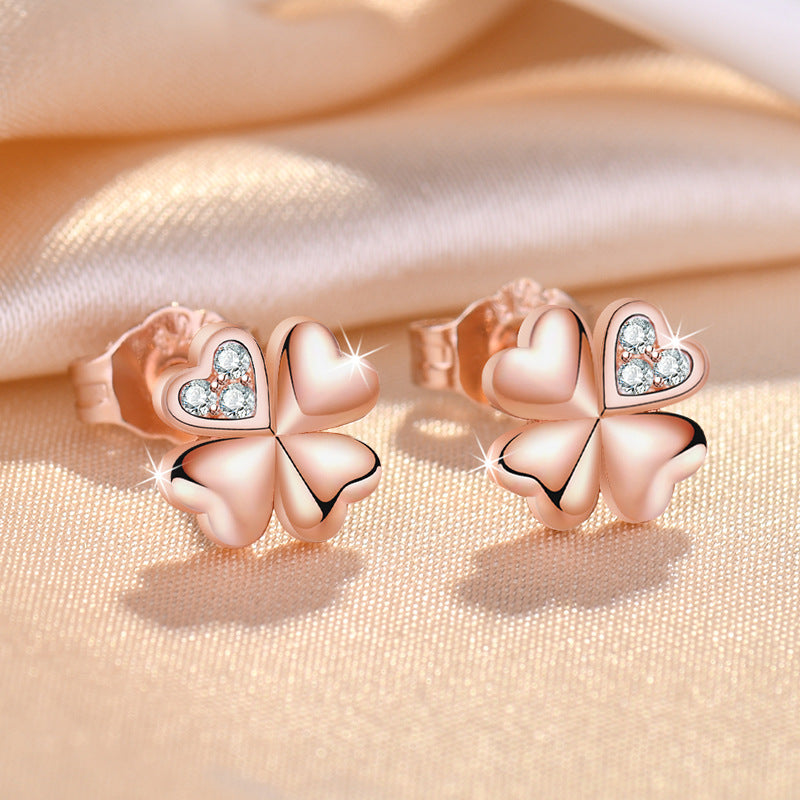 Damen Ohrringe mit floralem Herzmotiv und funkelnden Zirkonia Shop Nory