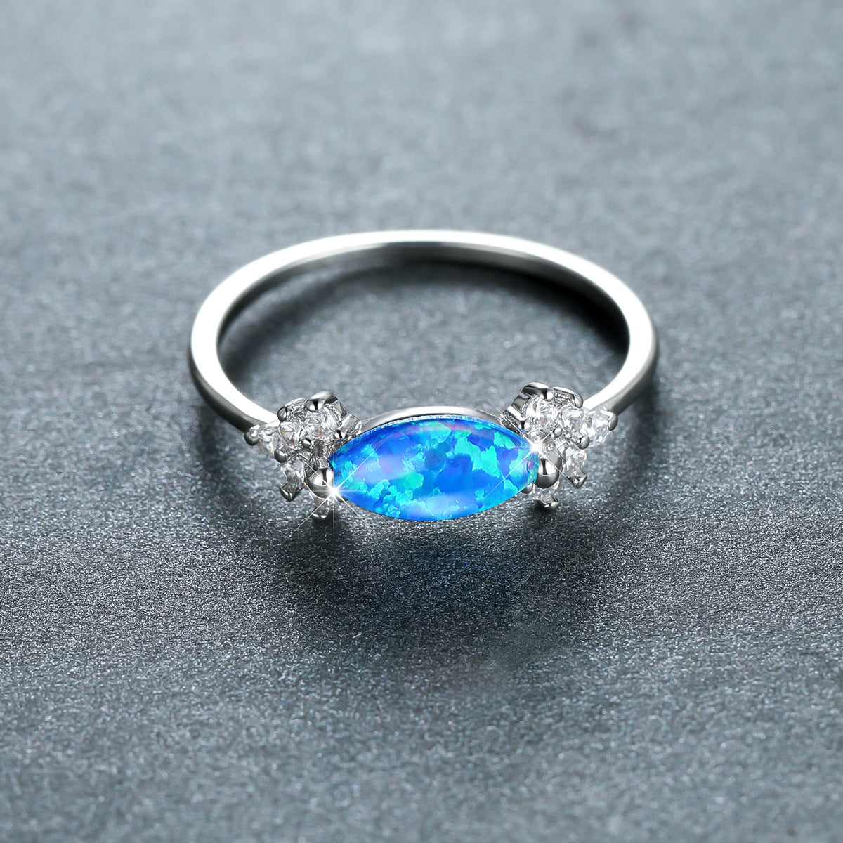 Damen Ring mit schillerndem Opal und funkelnden Zirkonia Shop Nory