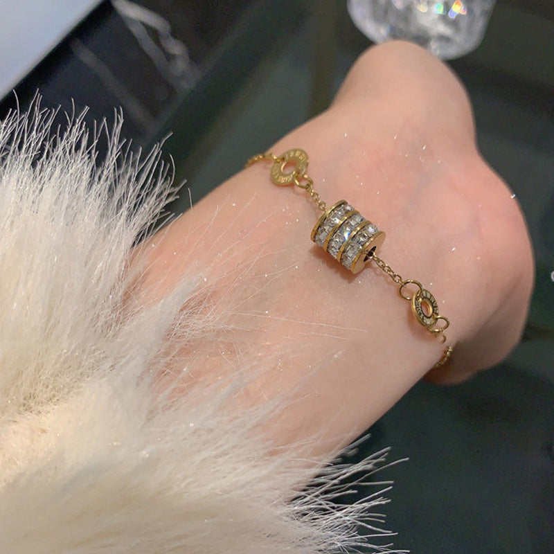 Damenarmband mit kunstvollen Blütenmotiven und hochwertiger Vergoldung Shop Nory