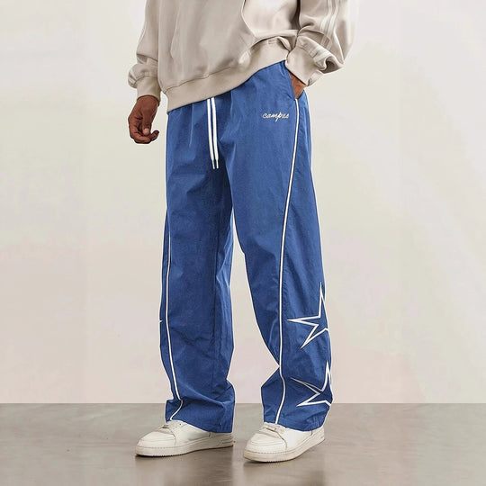 Herren Weite Trackpants mit Kontrastpaspel, Kordelzug und Sternapplikation Shop Nory