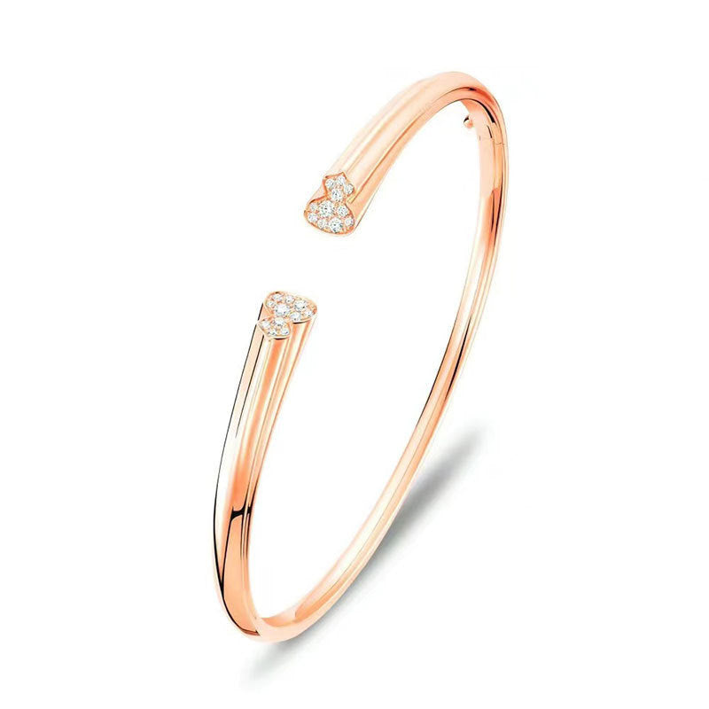 Damen Armband mit herzförmigem Anhänger und funkelnden Kristallen Shop Nory