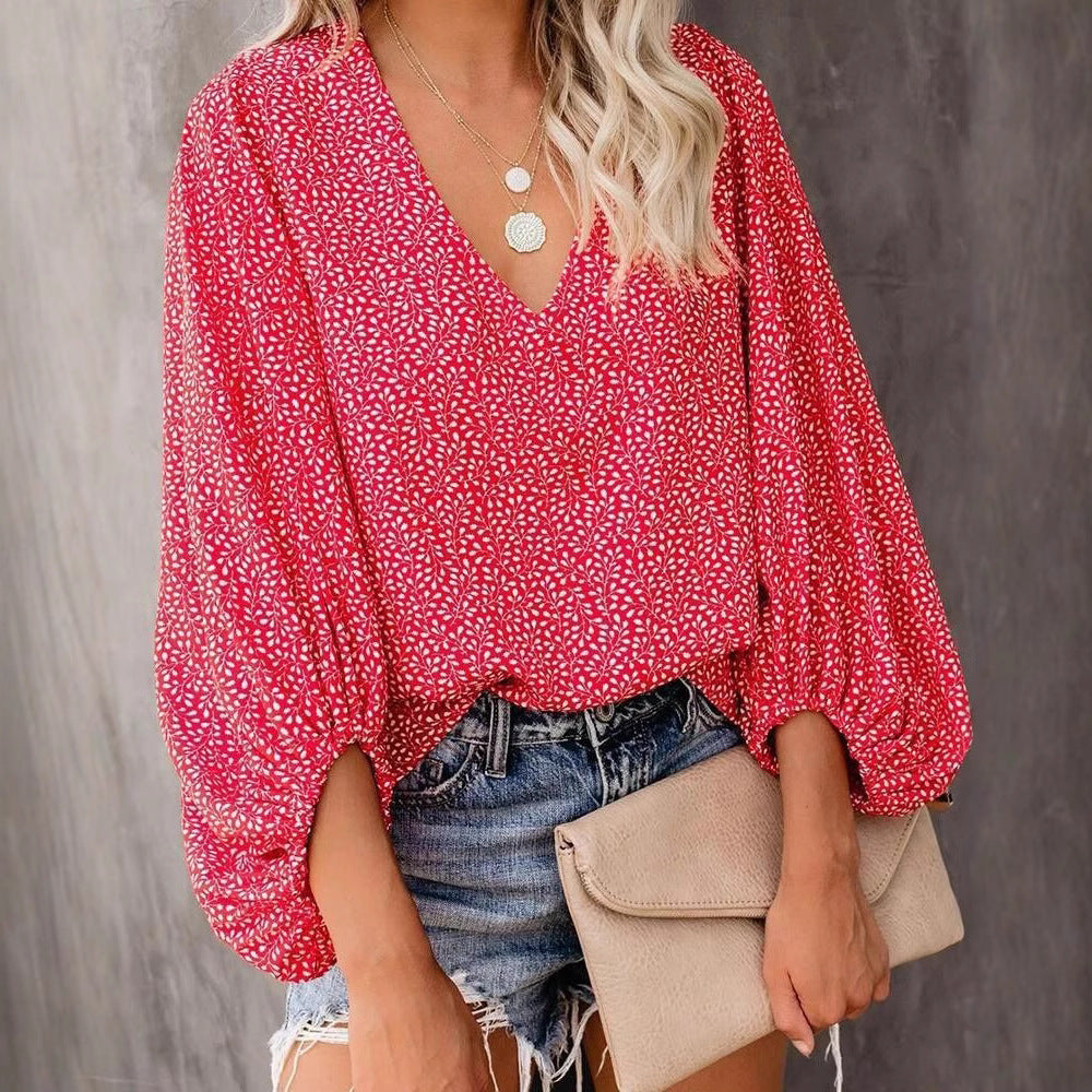 Damen Bluse mit weiten Ärmeln und floralem Muster