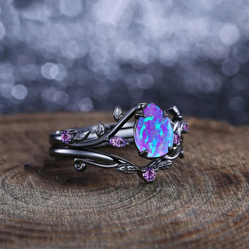 Damen Ring mit kunstvollem floralen Design und leuchtendem Opal Shop Nory