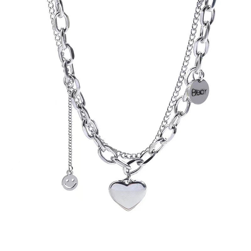 Damen Kette mit charmantem Herzen- und Smiley-Anhänger Shop Nory
