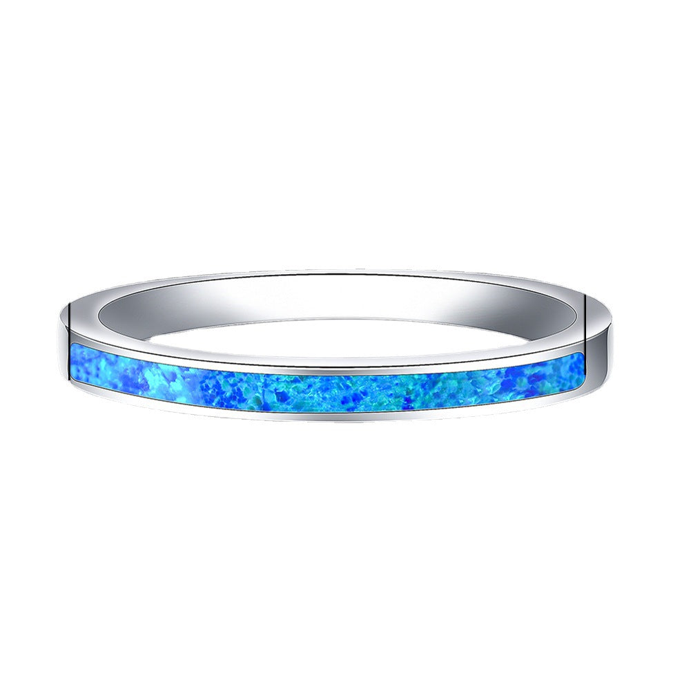 Damen Ring mit schimmerndem Opal und eleganter Edelstahlfassung Shop Nory