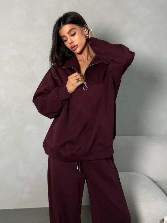 Damen lässiges Sweatset mit halbhohem Reißverschluss Kragen und weitem Jogger Shop Nory