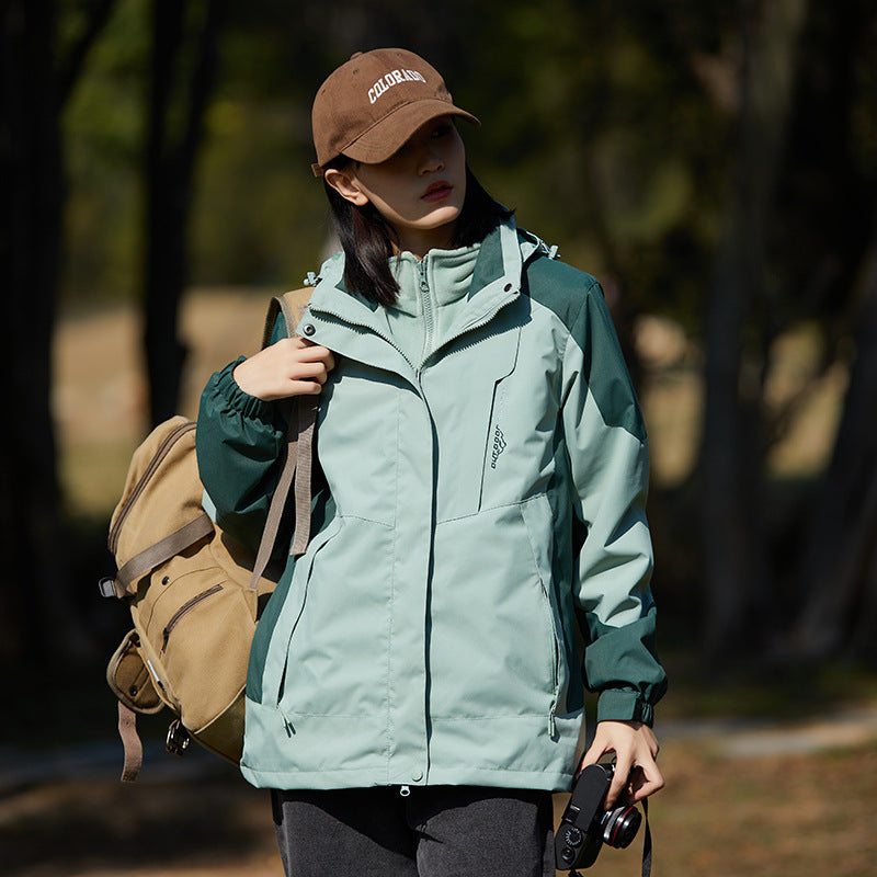 Damen zweilagige wasserabweisende Outdoorjacke mit Kapuze, Taillenregulierung und Kontrastbesätzen Shop Nory