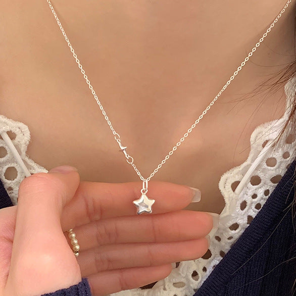 Damen Halskette mit funkelndem Sternanhänger und elegante Verbindungsdetails Shop Nory