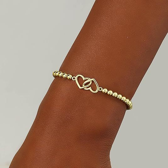 Damen Armband mit zeitloser Herz- und Perlenstruktur Shop Nory