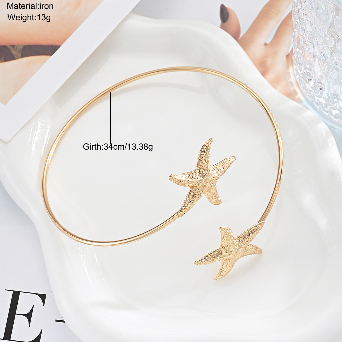 Damen goldfarbener Armreif mit maritimen Sternenmotiv Shop Nory
