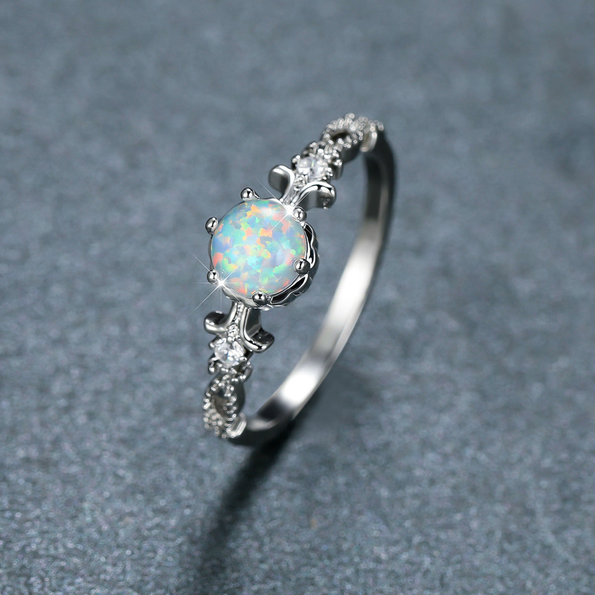Damen Schmuckring mit opalisiertem Stein und filigranem Design Shop Nory