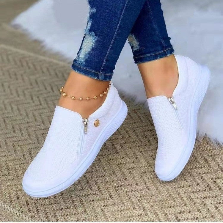 Damen Slip-On Sneakers mit seitlichem Reißverschluss und atmungsaktiver Textur