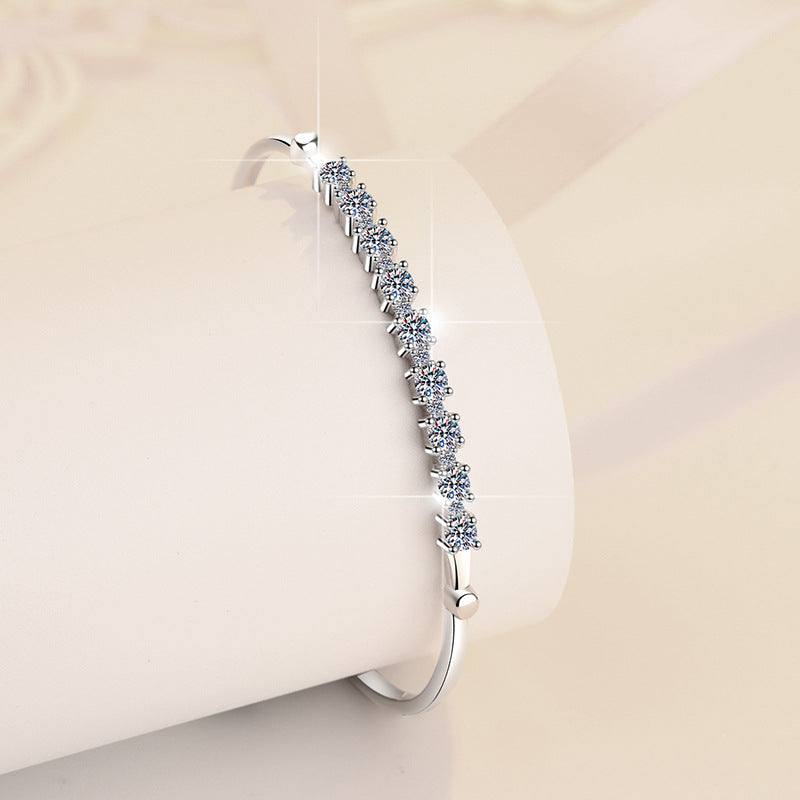 Damenarmband mit funkelnden Zirkonia-Steinen und eleganter Fassung Shop Nory