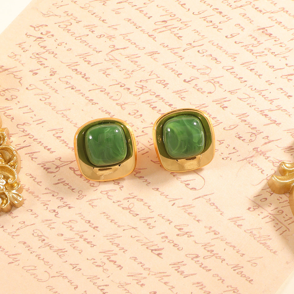 Damen Ohrstecker mit elegantem, grünem Halbedelstein und goldenem Rahmen Shop Nory