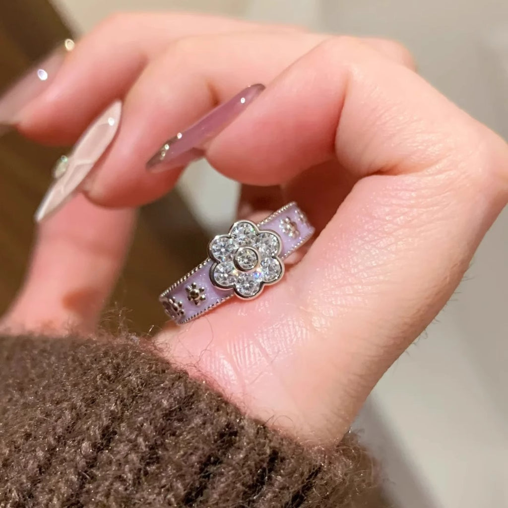Damenring mit funkelndem Blumendesign und hochwertigem Silberband Shop Nory