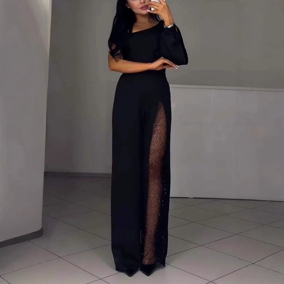 Damen Eleganter Jumpsuit mit transparenten Einsätzen und Pailletten