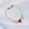 Damen Armband mit herzförmigem Anhänger und funkelnden Kristallen Shop Nory