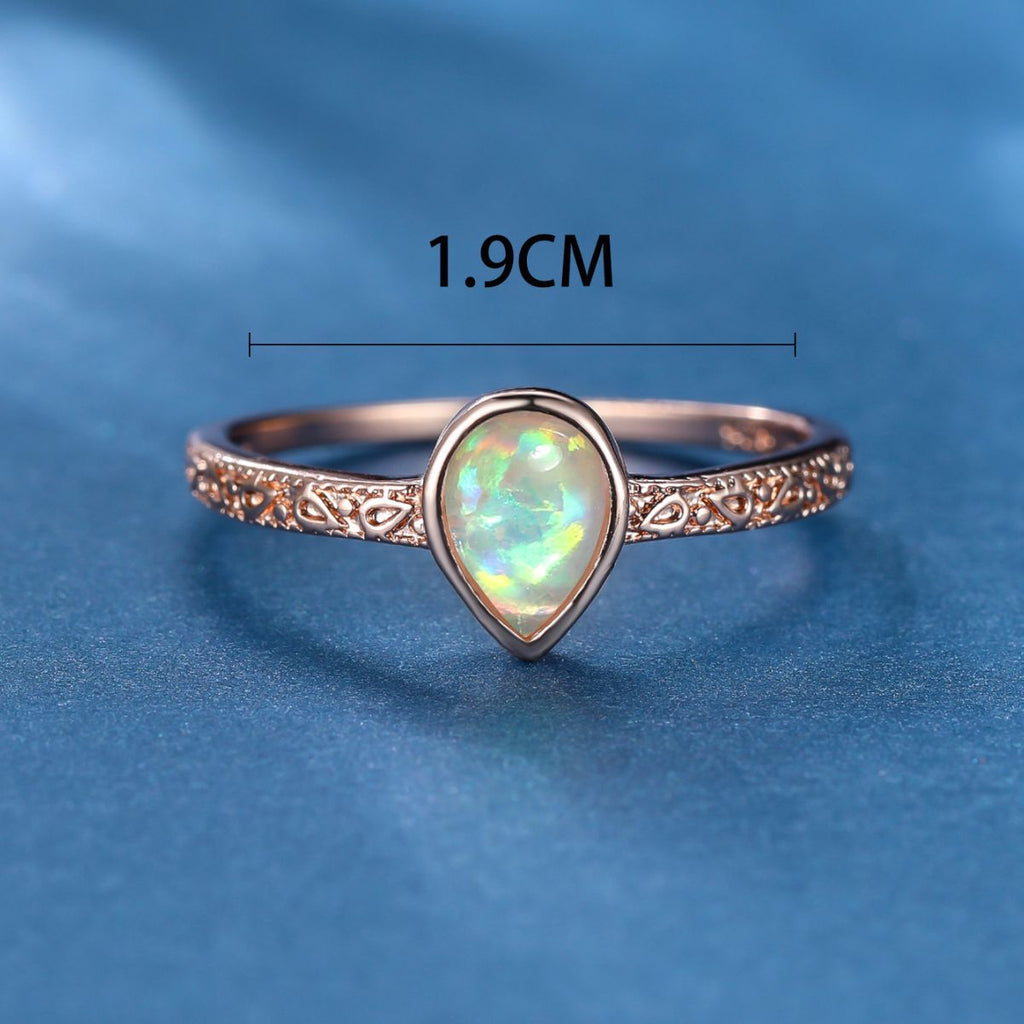 Damen Ring mit tropfenförmigem Opal und filigraner Zirkonia-Verzierung Shop Nory