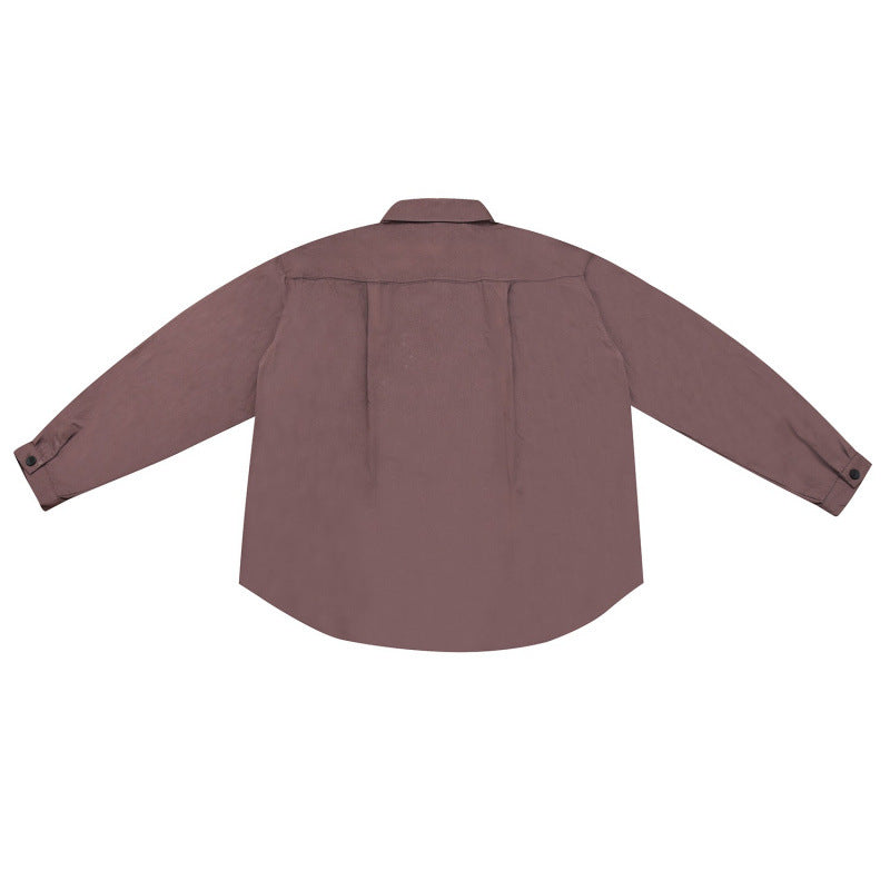 Unisex Weite Hemdjacke im Overshirt‑Cut mit abgerundetem Saum und schrägen Pattentaschen Shop Nory
