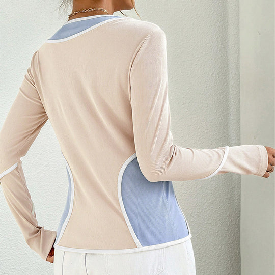 Damen figurbetontes Colorblock-Longsleeve mit Rundhalsausschnitt geschwungener Seitenpaneel‑Optik und feiner Rippstruktur Shop Nory