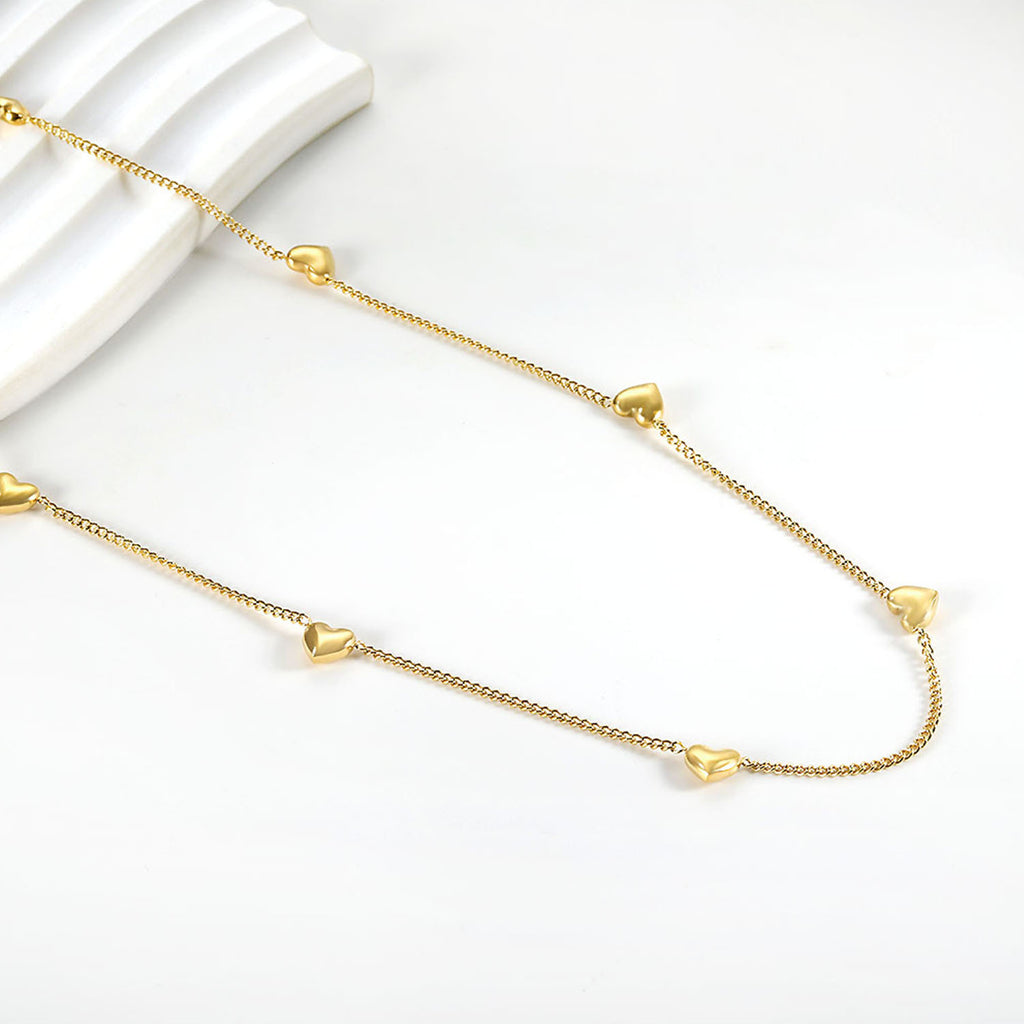 Damen Halskette mit herzförmigen Anhängern und eleganter Kettengestaltung Shop Nory