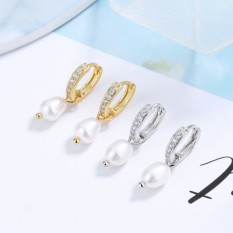 Damen Ohrringe mit eleganten Zirkonia-Verzierungen und Perlenanhängern Shop Nory
