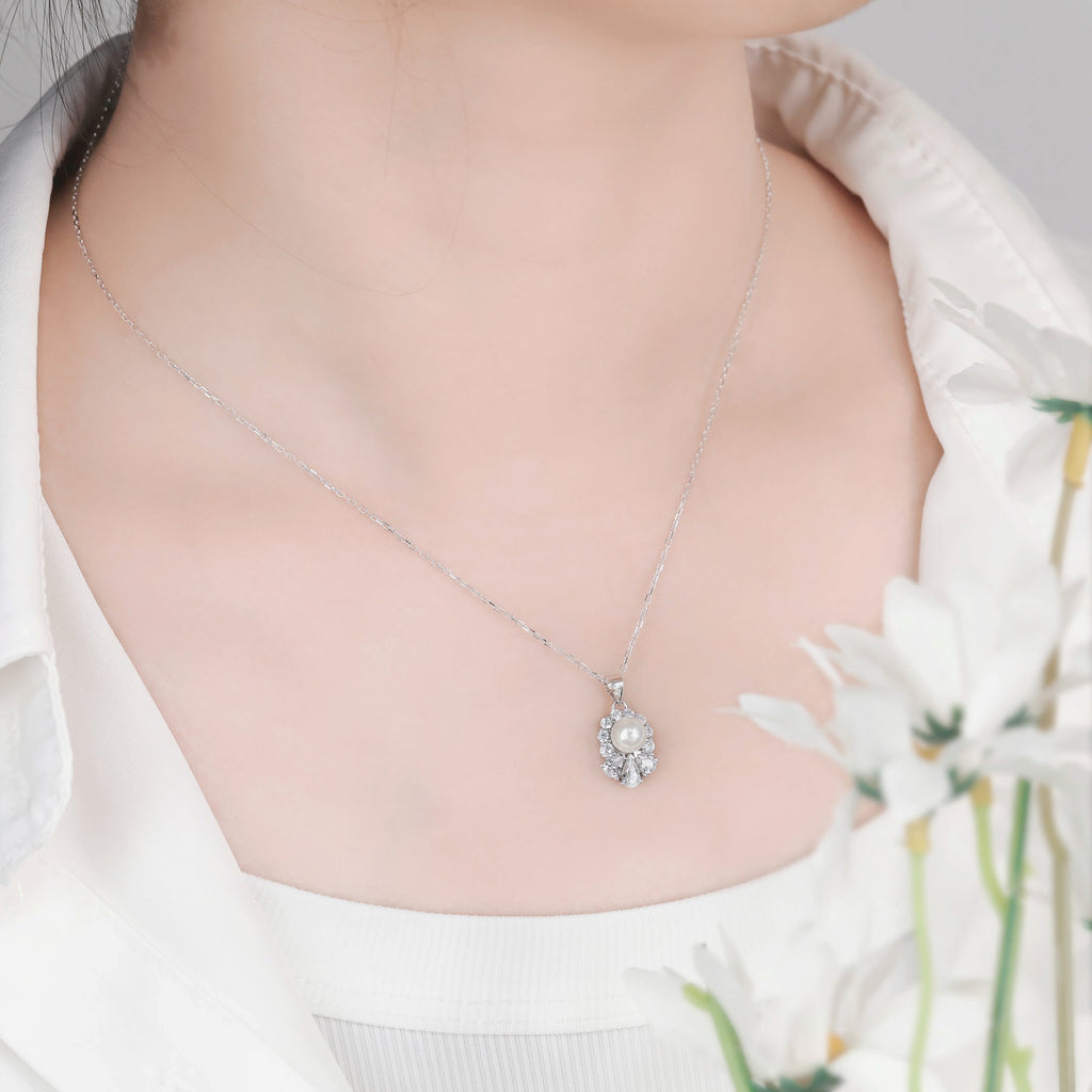 Damen Halskette mit elegantem Perlenanhänger und funkelndem Zirkonia-Besatz Shop Nory