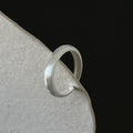 Damenring aus hochwertigem Edelstahl mit modernem, geschwungenem Design Shop Nory
