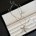 Damen Kette mit schimmerndem Seesternanhänger und exquisiten Perlendetails Shop Nory