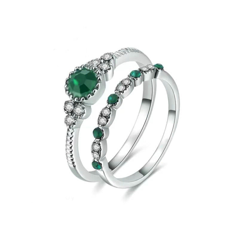 Damen glamouröser Ring mit grünem Edelstein und feinen Zirkoniasteinen Shop Nory