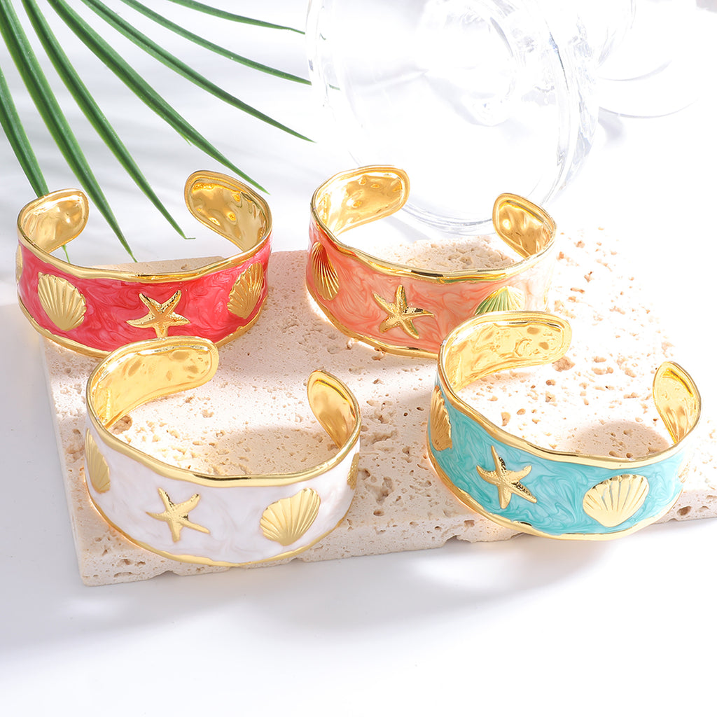 Damen Armreif mit maritimem Muschel- und Seestern-Design Shop Nory
