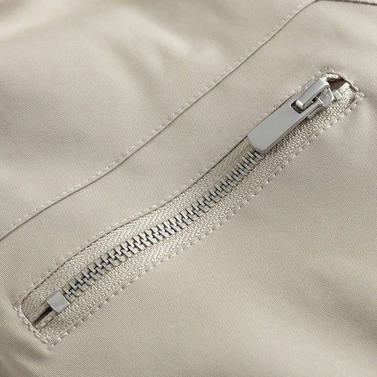 Unisex Boxy-Übergangsjacke mit hohem Stehkragen, kontrastierten Paneelen und Reißverschlusstaschen Shop Nory