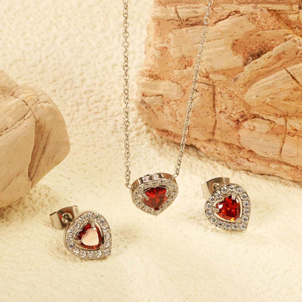 Damen Schmuckset mit funkelnden roten Zirkonia und elegantem Goldüberzug Shop Nory