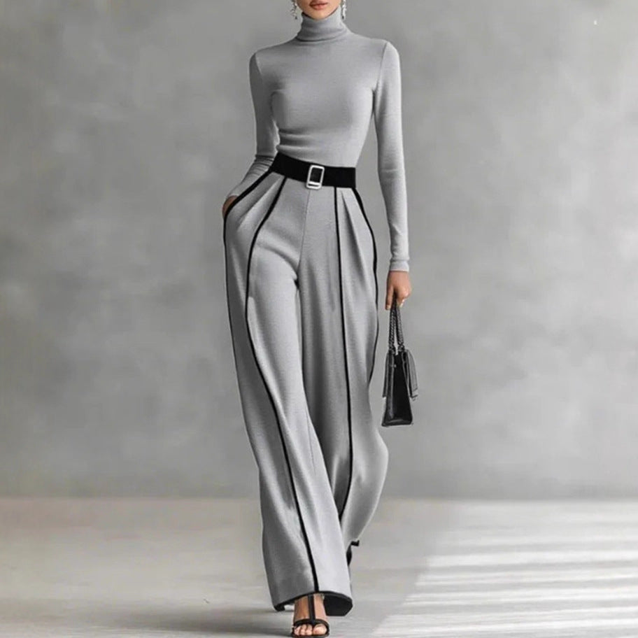 Damen nan elegantes Strickset mit tailliertem Rollkragenoberteil und weiter Plisseehose mit Taillengürtel