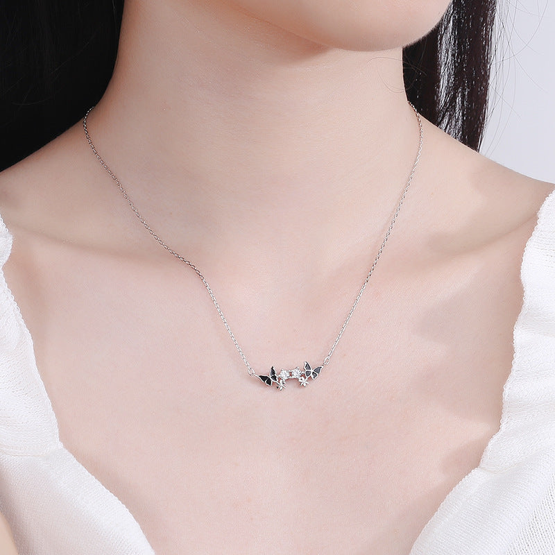 Damen Halskette mit filigranem Schmetterlingsdesign und funkelnden Zirkonia Shop Nory