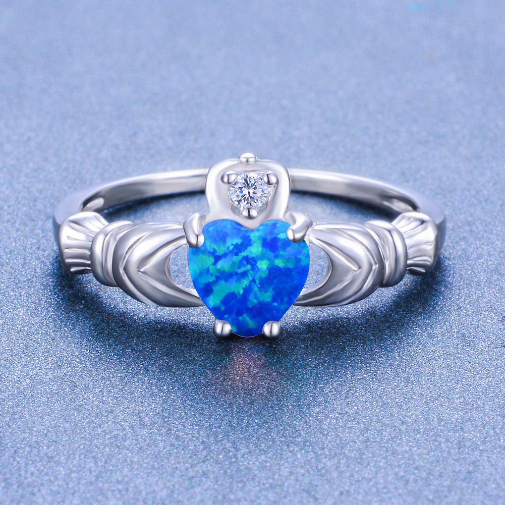 Damen Ring mit herzförmigem Opal und funkelnden Zirkonia-Elementen Shop Nory