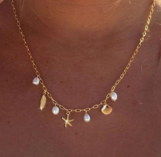 Damen Halskette im maritimen Stil mit Muscheln und Perlenanhängern Shop Nory