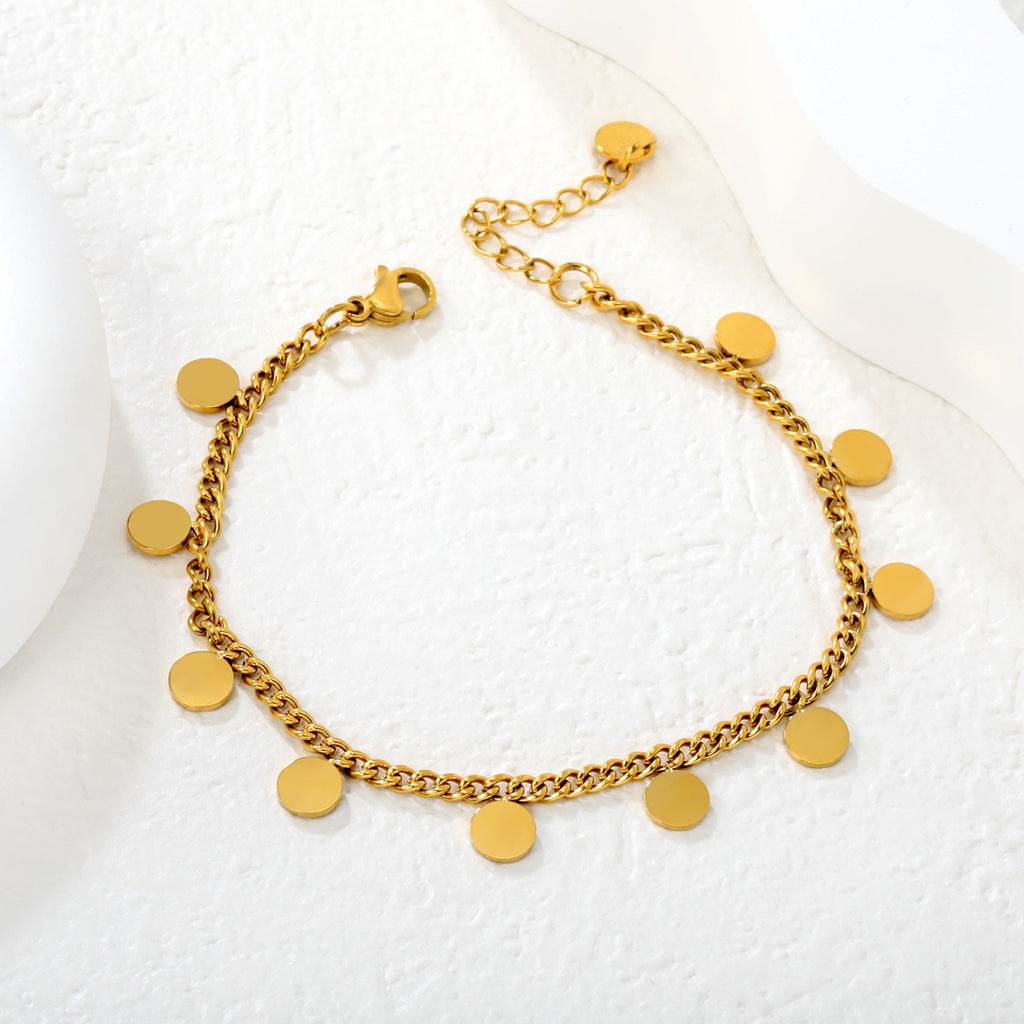 Damen stilvolles Armband mit glänzenden, runden Anhängern aus Edelstahl Shop Nory
