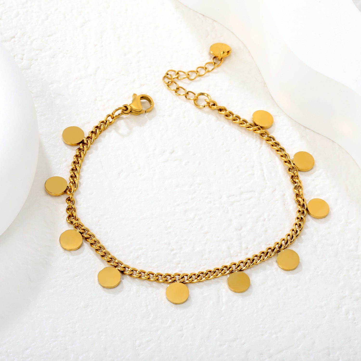 Damen stilvolles Armband mit glänzenden, runden Anhängern aus Edelstahl Shop Nory