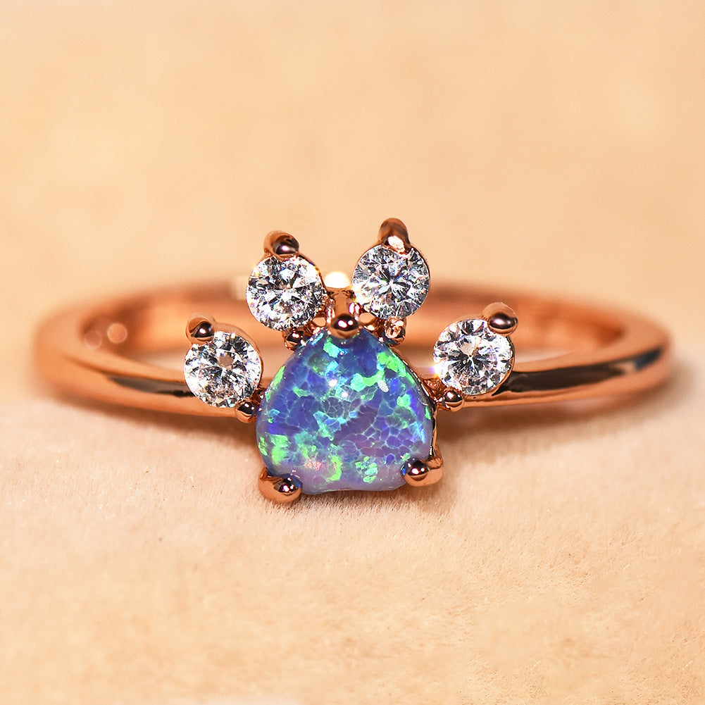 Damen Ring mit funkelndem orangefarbenem Stein und floralem Design Shop Nory